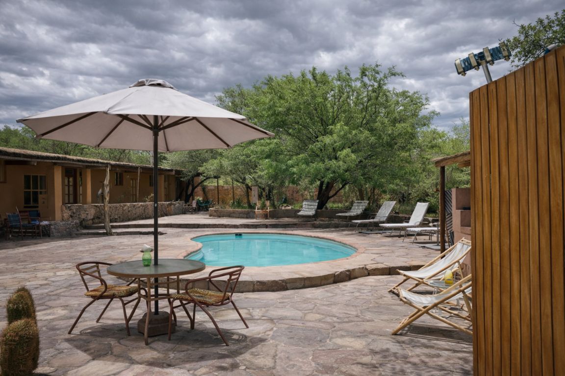 Relaxing pool area at Hotel Tulor in San Pedro de Atacama, captured during a custom tour organized by Atacama Chile Tours.